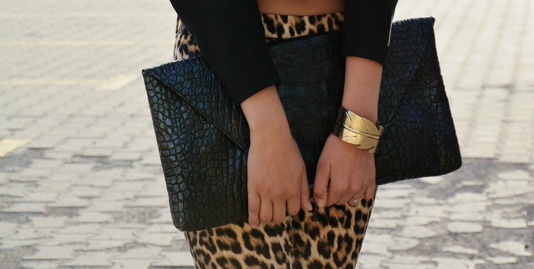 Katarzyna Chocyk Zara leopard print pants H-M black cropped sweater Zara sandals oversized envelope clutch purse