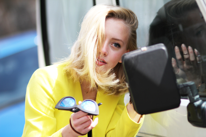 Sarah Mikaela wearing yellow H-M TREND BLAZER ASOS mirrored blue sunglasses
