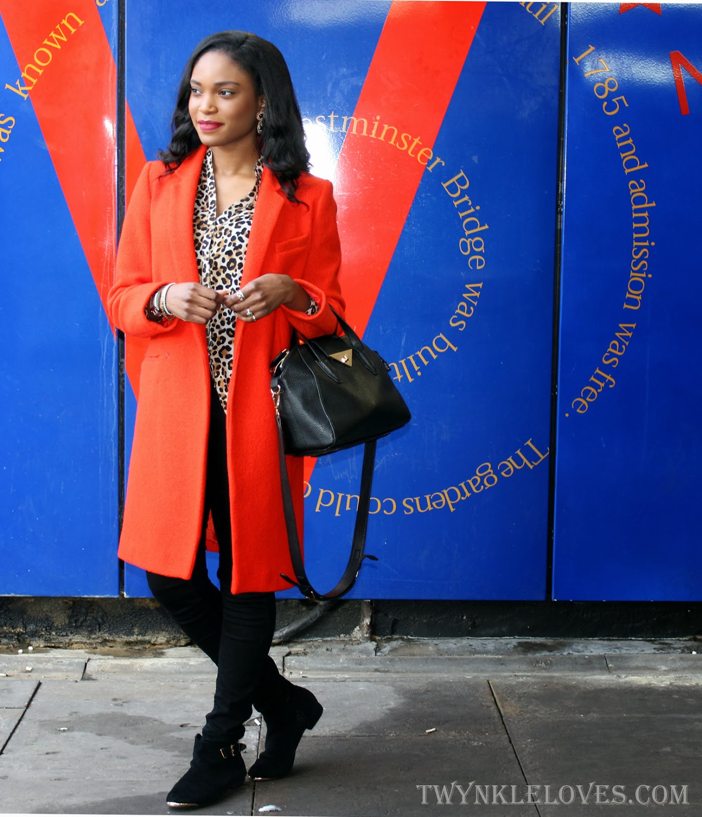Abigail Ayoola twynkleloves blogger wearing orange french connection boucle coat