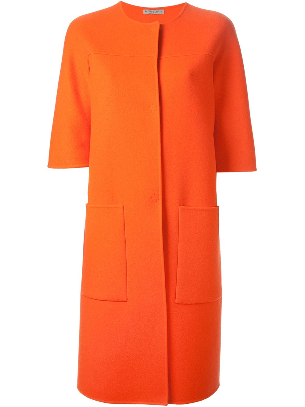 Orange cashmere single breasted coat from Bottega Veneta