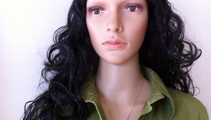 Mannequin in green George blouse