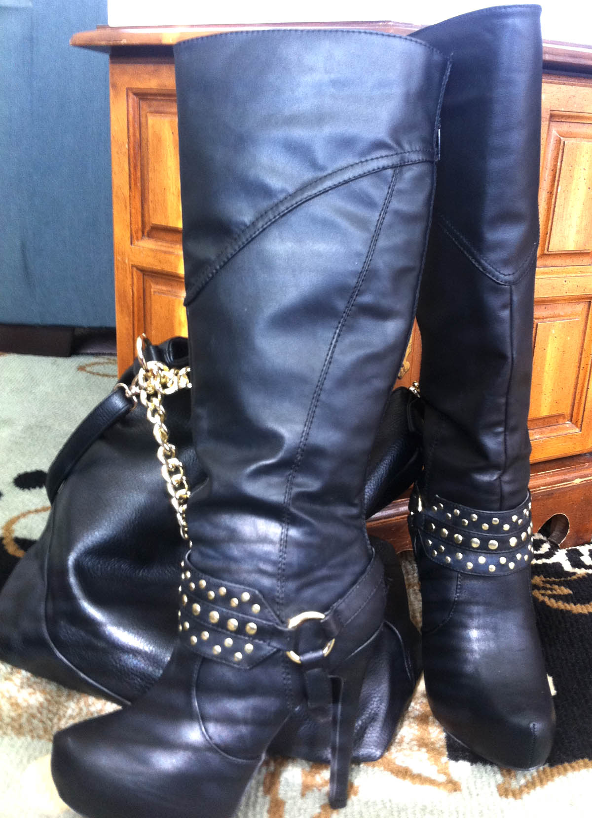 JustFab Diyana black faux leather knee high boots with gold details and Maxwell faux leather bag black