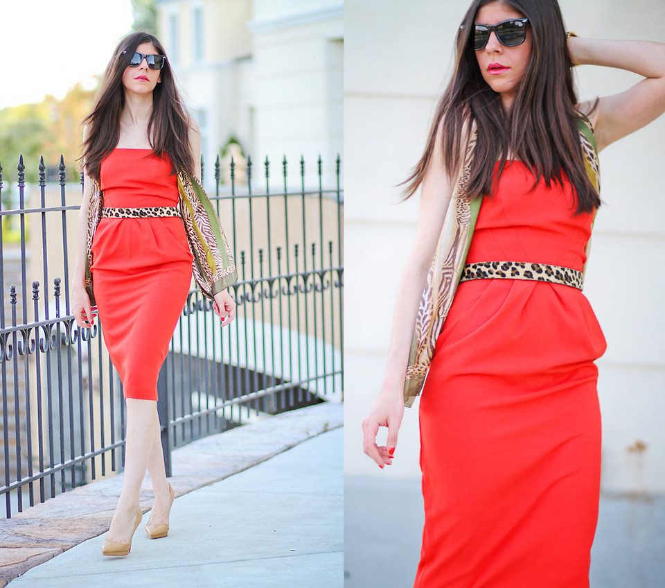 Blogger Erika Marie wears a strapless red dress with nude Christian Louboutin Pigalle pumps