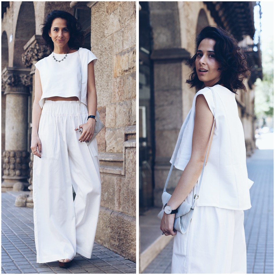 Milagros Plaza style blogger from Barcelona Spain wearing white crop top with White High Waist Palazzo Trousers