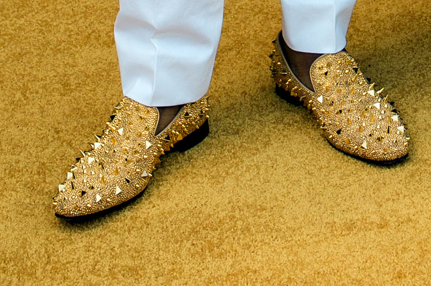 Taylor Glascock photograph of Dante Fowler Jr wearing Christian Louboutin gold spiked loafers