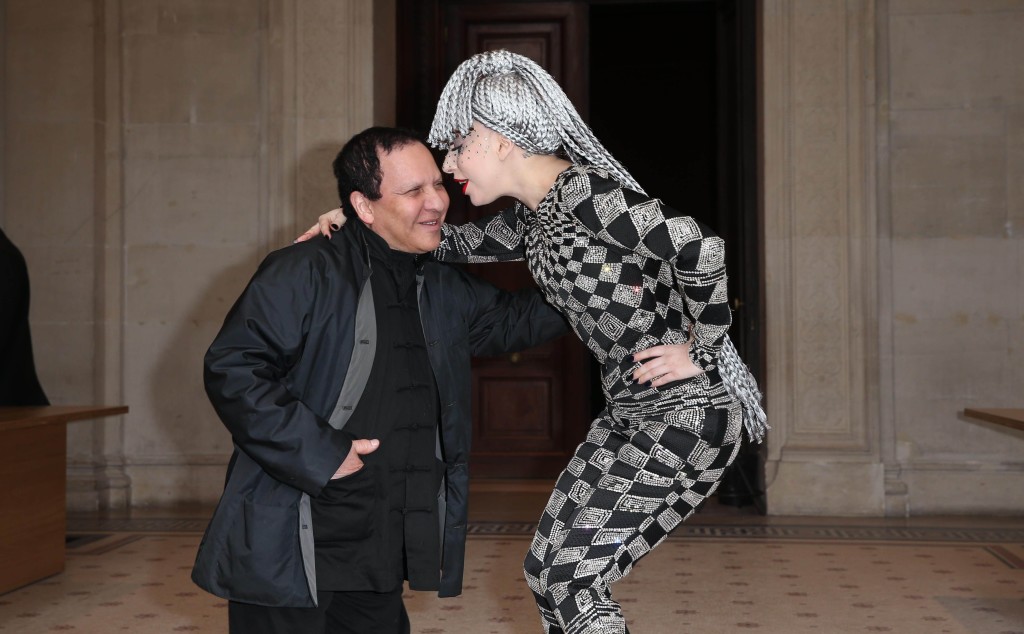 Azzedine Alaia posing with Lady Gaga