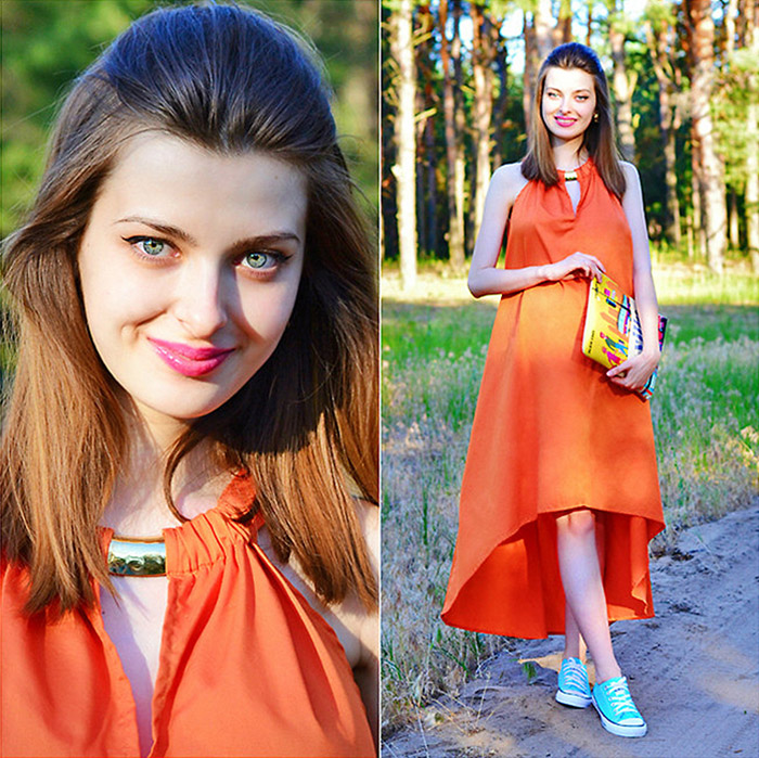 Malinina-ek from the Ukraine wearing an orange dress with turquoise blue converse sneakers