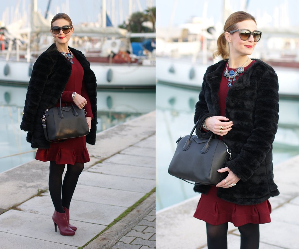 Vale from the blog Fashion and Cookies wears burgundy ankle boots with a burgundy dress