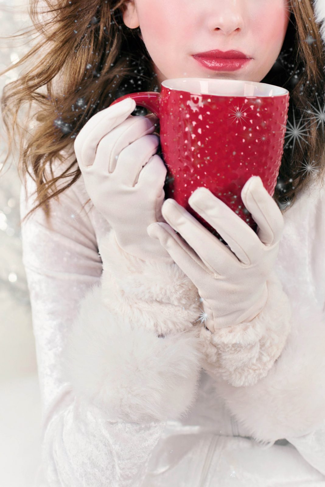 Lady in white with red mug