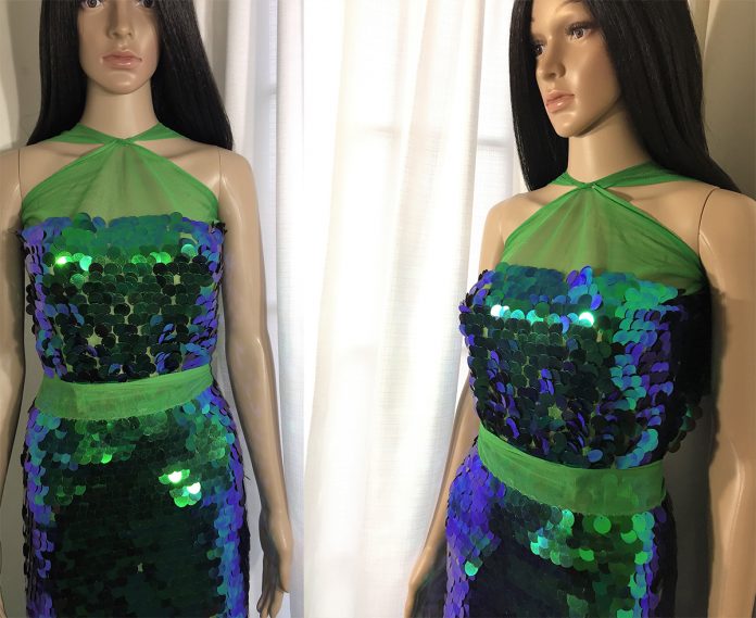 Justine the mannequin wearing makeshift green sequin dress