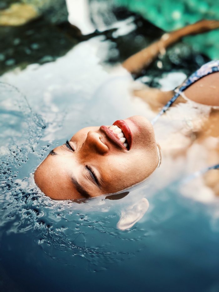 Girl Smiling in Water