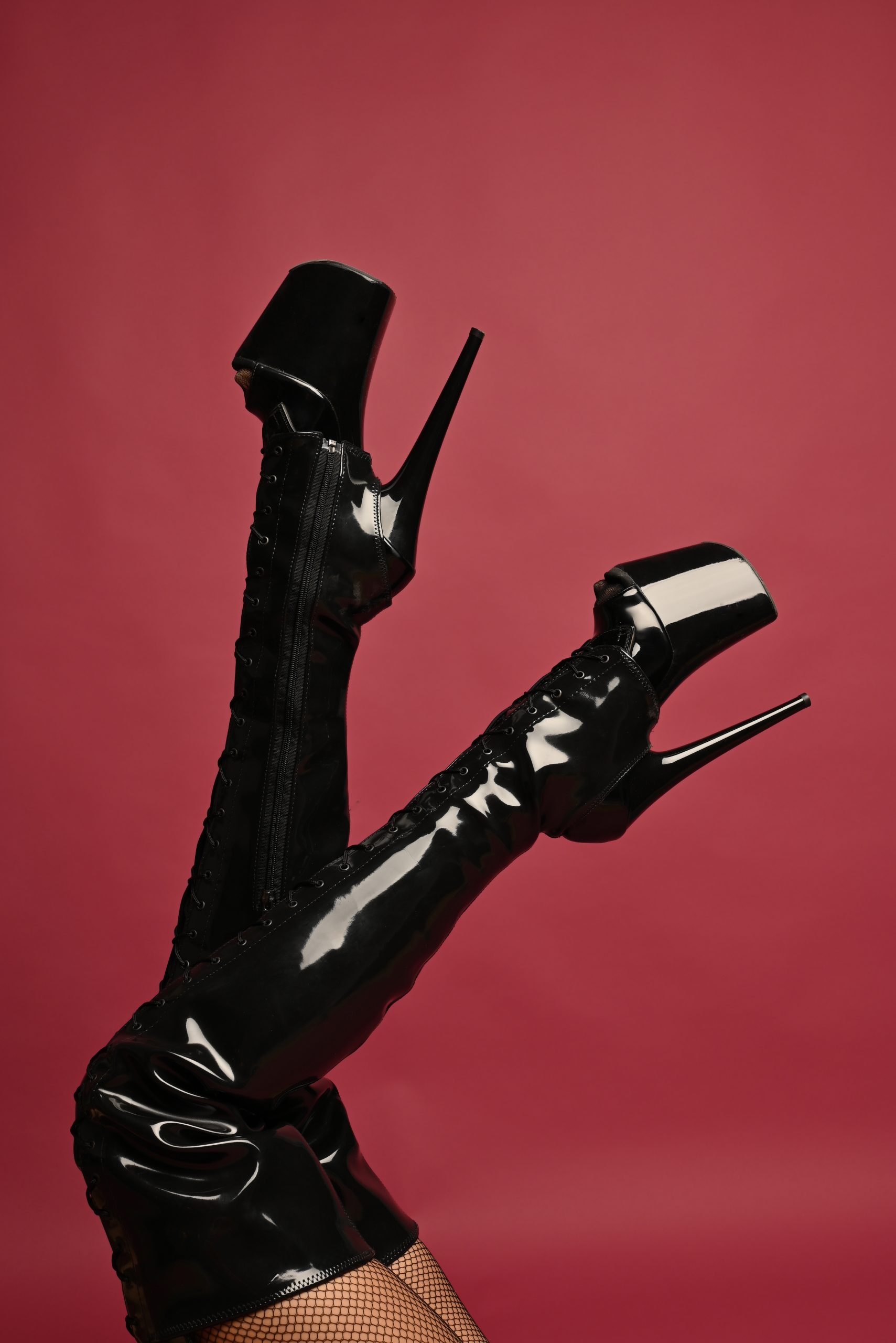 Black shiny patent leather knee stiletto high heels - stock photo open toe platform stiletto boots - via stock.adobe.com