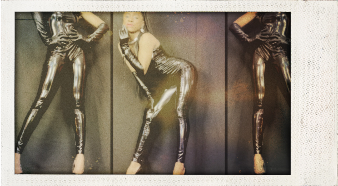 Adelamonica wearing Sydney Holographic black latex jumpsuit fashion nova6840