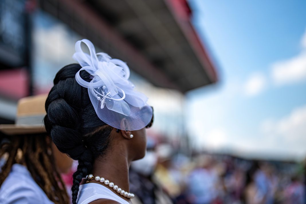 Kentucky Derby dress code woman white fascinator hat